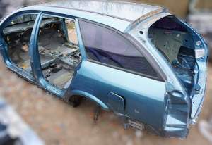 SZYBA BOCZNA TYŁ P/L NISSAN PRIMERA P12 KOMBI