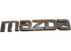 EMBLEMAT ZNACZEK KLAPY BAGAŻNIKA MAZDA 6