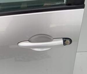 KLAMKA DRZWI LEWA PRZÓD NISSAN PRIMERA P12