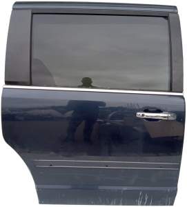 ZAMEK DRZWI PRAWY TYŁ VOLKSWAGEN ROUTAN