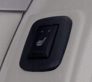 PRZYCISK OGRZEWANIA SIEDZISKA FOTELA LEWY TYŁ VOLKSWAGEN ROUTAN