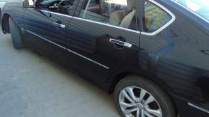 DRZWI PRZEDNIE LEWE GOŁE INFINITI M35X 05-10